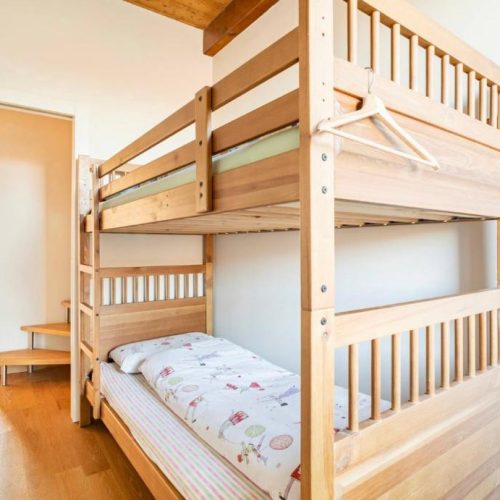 Bedroom with wooden bunk beds